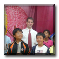 ESL Teacher Peter takes a break with his students