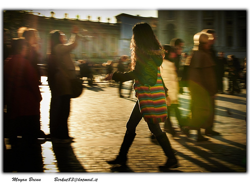 Walking girl in a crowd