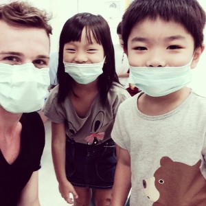 teacher and students in masks