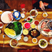 An arrangement of foods and items set on a table for Taiwanese BBQ.